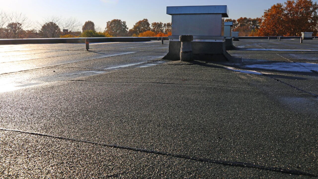 Flat roof sealing on commercial building